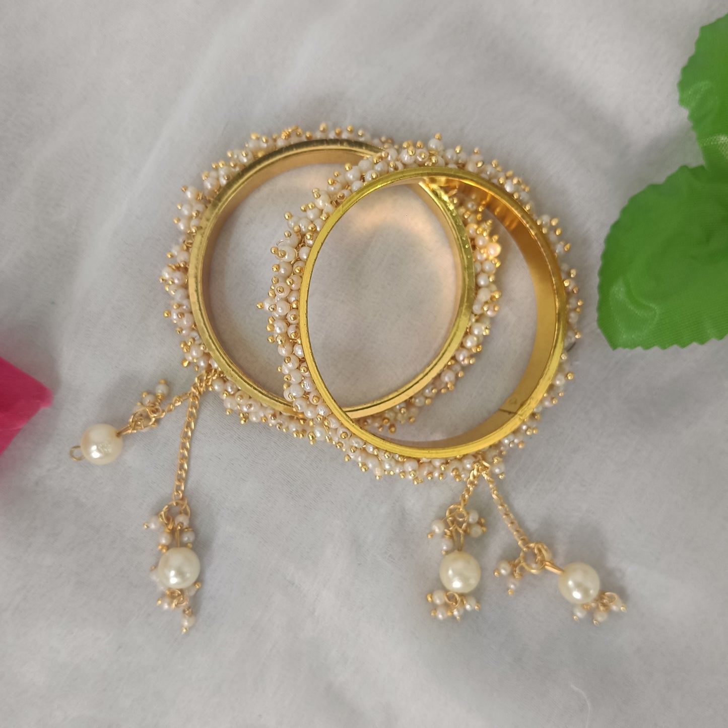 Elegant Gold-Plated Bangles with White Pearl Clusters & Latkan Charms – Set of 2