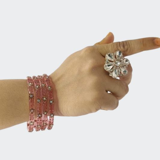 Soft Transparent Pink Floral Bangles in hand