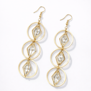 Gold crystal geometric drop earrings for women on white background, lightweight designer earrings