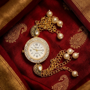 kashmiri bracelet watch on red fabric gold pearl tassel luxury ethnic jewelry watch