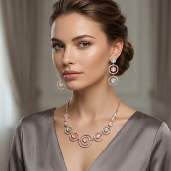 Elegant woman wearing rose gold crystal necklace set with pastel green and pink stones and matching earrings